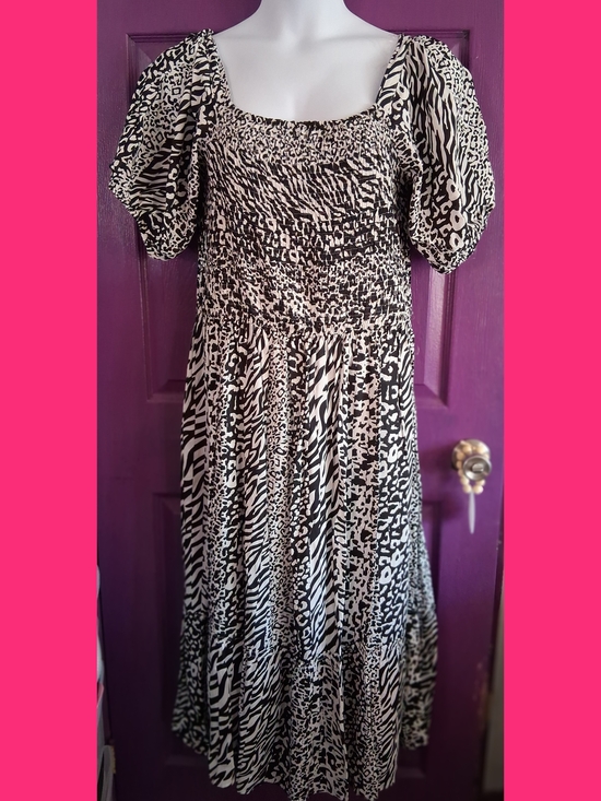 Love By Design Dresses & Skirts - Love By Design Black Animal-Print Puff Sleeve Dress